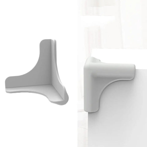 4 Pack Silicone Corner Guards For Furniture And Cabinets Baby Edge Protectors shown on a table edge, gray silicone material