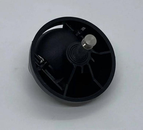 Close-up of black swivel wheel hub for robot vacuum replacement part with a metal axle.