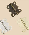 Three mini butterfly cabinet hinges in bronze zinc alloy, each measuring 20mm x 17mm, displayed on a neutral background.