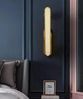 Top Shelf Copper Wall Sconces With Bright Acrylic Shades For Bedrooms And Living Rooms Sleek Glare Free Lighting on dark wall.