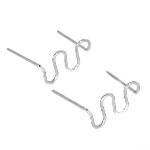 Close-up of two stainless steel 1000Pcs Welder Staples 0.6mm S Wave Staples For Auto Bumper Repair And Plastic Bodywork Kit.