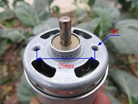 Badass 12 Volt 775 Series Dc Motor High Speed Heavy Duty Carbon Brush Design Delivers Knockout Torque For Electric Power Tools And Quick Diy Upgrades Runs Totally Smooth, showing top view with shaft measurements.