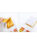 All In One Litmus Paper Test Kit With 80 Pcs pH Strips for Water and Soil Testing: close-up of yellow strips and color chart
