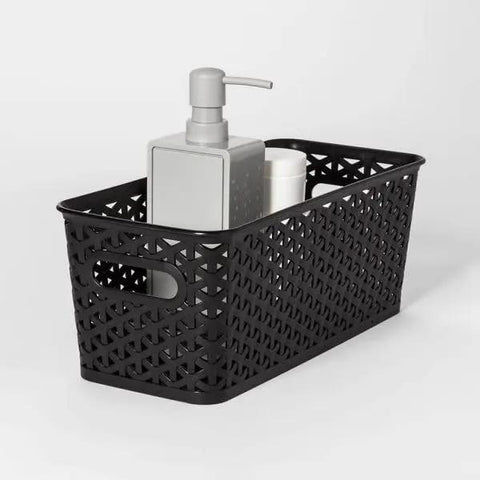 No Sweat Home Organization Decorative Storage Basket For Cube Systems And Desk Shelves, Sturdy Plastic Woven Organizer With Total Game Changer And Clean Setup Vibes In Sleek Black Medium holding a soap dispenser and cup.