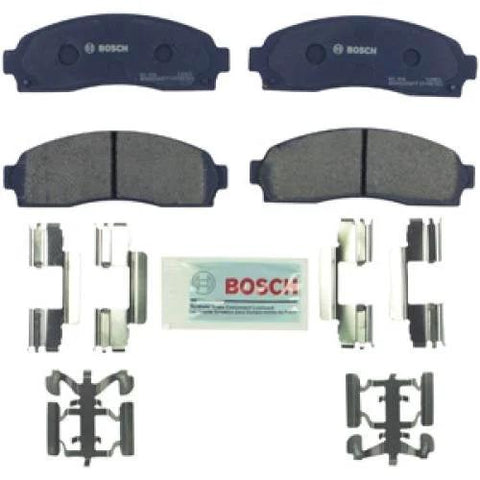 Bosch BC833 QuietCast ceramic front brake pad set with hardware; two blue pads and mounting clips