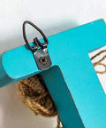 Pack Of Two Dope Rustic Metal And Wood Wall Hooks Featuring Home Love Script Built Tough For Daily Use Perfect For Hanging Hats Towels And Coats Adding Fresh Vibe To Your Entryway, close-up of blue hook detail.