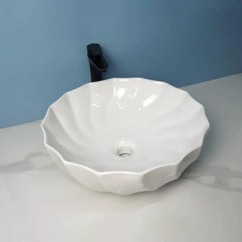 USZWBY Vessel Sinks Modern Minimalist Hotel Washroom Above Basin Bathroom Round Washbasin Ceramic Vessel Sink Bathroom Bowl Sink with a fluted design.