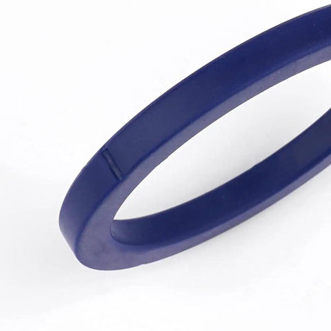 Close-up view of blue silicone group gasket, 78mm diameter, 7mm height, for La Marzocco espresso machines grouphead replacement part.