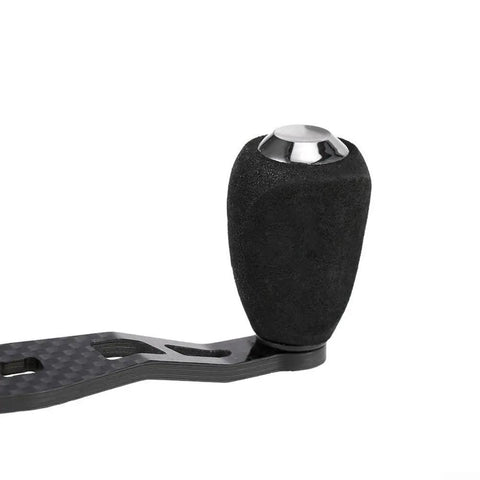 Switch Up Your Gear With This Super Lightweight Carbon Fiber Fishing Reel Handle Featuring A Rock Solid Left Or Right Side Eva Grip Knob That Slams Into Any Rod For Serious Angling Adventures. Carbon fiber fishing reel handle with EVA grip knob, close-up