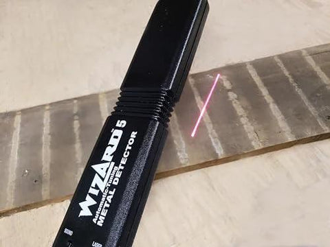 Side view of Lumber Wizard 5 metal detector for woodworking, black handheld device with WIZARD label and pink laser line