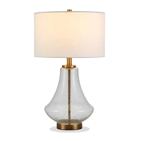 23 Inch Tall Table Lamp With Seeded Glass Shade Polished Nickel Finish And Flax Linen Fabric A Stylish Nightstand Or Side Table Light That Delivers Cozy Glow And Modern Vibe featuring a curved glass base and drum shade