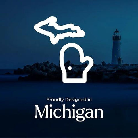 Illustration of Michigan state outline with lighthouse in the background, text reads 'Proudly Designed in Michigan'