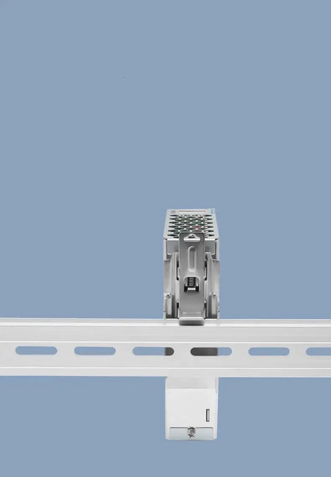 Close-up of 12V DC DIN Rail Power Supply 120W 10A Dual Output Wide 100 To 240VAC Input 12VDC Output Rugged Industrial Grade installed on rail.
