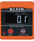 Klein Tools 935DAG digital angle gauge with orange housing, front view, displays 0.1° and ranges 0–90°, 0–180°
