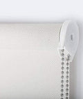 Close-up of a roller blind with 4.5 millimeter stainless steel bead chain for blinds and shades with five connectors, installed, 3 meters long