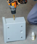 Heavy Duty Step Drill Bit Set For DIY With Spiral Double Fluted Titanium Nitride Coated Bits in use on metal surface