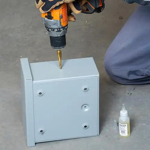 Heavy Duty Step Drill Bit Set For DIY With Spiral Double Fluted Titanium Nitride Coated Bits in use on metal surface