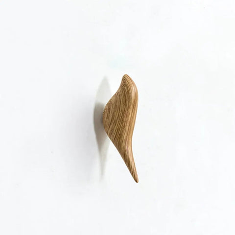 Straight Up Best Bird Shaped Resin Wall Hook With Wood Grain Finish For Coats And Hats Slick Wall Mounted Bedroom Organizer Smooth Edge Design Sweet Home Decor Plus Hassle Free Install mounted on a white wall.