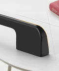 Close-up of Five Pack Solid Black Long Cabinet Handles Five Point Eight Three Inch Drawer Pulls on a white surface.