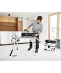 Cordless Table Saw With Battery Powered Circular Blade For Drop Dead Accurate Miter And Parallel Cuts Compact Portable Benchtop Tool in a wooden interior.