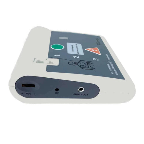 AED training defibrillator Practi-Trainer base in light gray with dark front panel and DC/audio ports