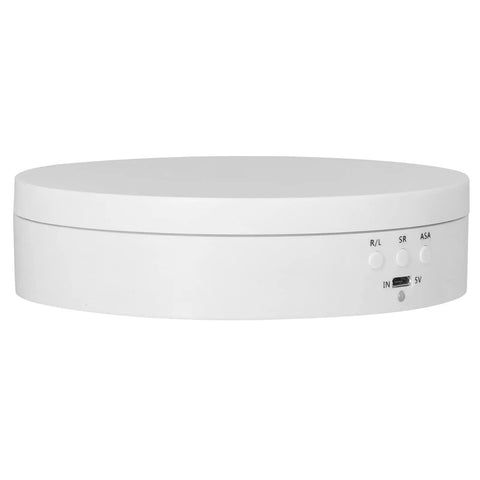 Motorized Electric Turntable Display Stand With Silent 360 Degree Rotation For Jewelry And Watches Shop Exhibition Strong Abs Build Holds Heavy Items Noiseless Smooth Movement Perfect For Retail Showcase top view of white ABS display stand with control buttons