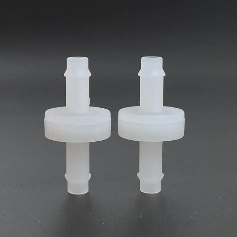 Two white PVDF one-way ozone check valves with barbed fittings for spa tubing.
