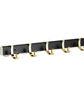 Sturdy Steel Wall Mounted Coat Rack Cool Fix For Your Hallway Or Living Room Easily Park Your Outerwear Totes And Keys To Keep Your Pad Spotless With Super Easy Everyday Storage, features gold hooks on a black base.