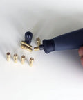 Top Tier Brass Drill Chuck Collet Bits Set With 3.17 Mm Shafts And Wide 0.5-3 Mm Range For Dremel Rotary Tools shown in hand.
