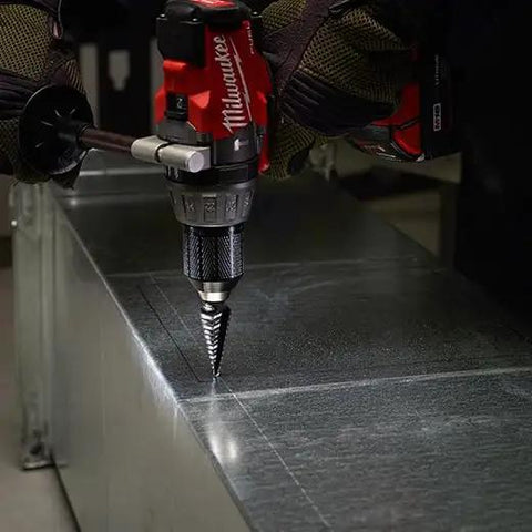 Milwaukee cordless drill using Step Drill Bit No 1 For Cordless Drills At Turbo Speed From One Eighth Inch To One Half Inch on metal