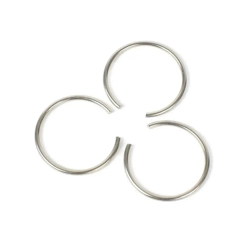 Three 0.7mm 304 Stainless Steel Round Snap Rings for retainer use in DIY home repairs and hardware projects.