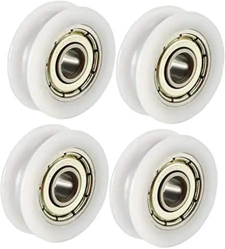 Four Pack V Groove Bearing Pulleys Featuring Rock Hard Metal Rollers Wrapped In Beefy Nylon Wheels for rail systems.