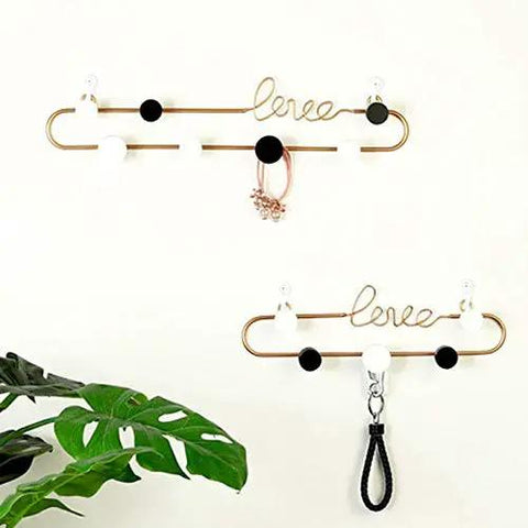 Dope Gold or Black Iron Wall Hook Shelf Decorative Rack for Keys Coats and Hats Perfect for Front Door Entryway to Spice up Your Home with a Trendy Vibe that Slays Every Time, featuring a stylish design with hooks and decor.