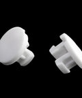 Top Shelf White Bottom Rail Cord Cover Buttons For Horizontal Blinds Repair, Pack Of Twelve Heavy Duty Tape Lock Plugs angled view.