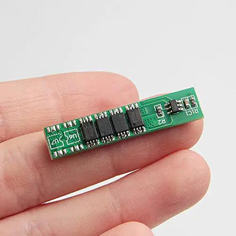 Solid 5 Pack 1S 3.7V 10A Lithium Ion BMS Protection Boards, compact green circuit board in hand for battery protection.