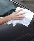 Hand using white rag on car, Bulk Jersey Knit T Shirt Rags Poly Cotton Cleaning Cloths For Painting Polishing Auto Shops And Bar Work 25 Lb Box