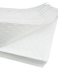 Heavyweight Oil Absorbing Pads For Garage Workshop Clean Up Oil Only Absorbent Mats 15 X 20 Inches Pack Of 50 polypropylene sheets stacked.
