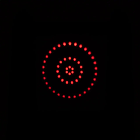 Red multi-dot reticle view from Reflex Sight For Telescopes With Multi Dot Reticle For Vixen Style Dovetail Base visible in darkness.