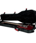 Open Molded Flight Case For SG Style Double Cutaway Guitars With ATA Roto-Molded Polyethylene Shell TSA Lock, red triggers, and plush interior.