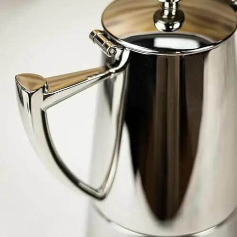 Close-up of a Stainless Steel Stovetop Espresso Maker For 6 Cups Easy To Clean Moka Pot With Heat Resistant Non Reactive Design Barista Grade Brew Durable Italian Style Coffee Percolator For Rich Bold Brew