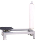 Heavy Duty Manual Table Stretch Film Dispenser For Pallet Wrapping Featuring Adjustable Tension Knob For No Hustle And Quick 12 To 20 Inch Roll Loading, gray with black base.