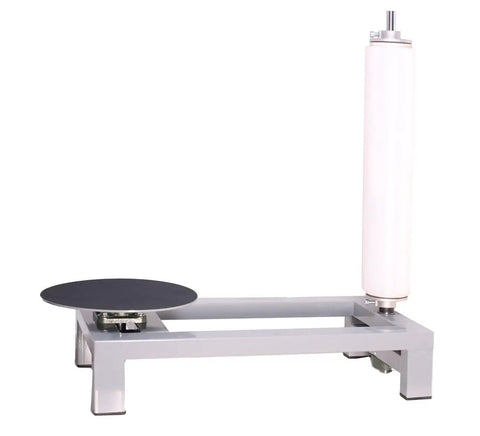 Heavy Duty Manual Table Stretch Film Dispenser For Pallet Wrapping Featuring Adjustable Tension Knob For No Hustle And Quick 12 To 20 Inch Roll Loading, gray with black base.