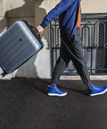 Side view of a brushed charcoal Delsey Paris Helium Aero hardside luggage, 24-inch, with spinner wheels
