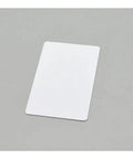 Super Slick Waterproof Plastic Inkjet Printable Cards Including 230 Pack White Blank ID Badge Photo Paper Sheets With Hella Durable Finish on grey surface.