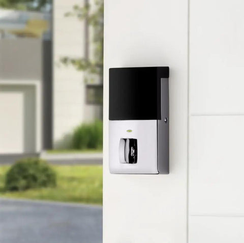 High End Oil Rubbed Bronze Touchscreen Deadbolt With Zwave Smart Home Link And Keyless Entry Crafted From Solid Brass For Bulletproof Single Cylinder Defense That Hits Different And Runs Crisp Through Phone Or Traditional Key mounted on a white door.