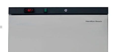 Top Shelf Commercial Workhorse Refrigerator With Heavy Duty Stainless Exterior And No Sweat Temperature Control For Busy Cafes Restaurants And Catering Services control panel with temperature display.
