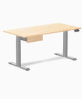 Slick 60 Inch Solid Maple Standing Desk With Integrated Wood Drawer Adjustable Height Ergonomic Home Office Workstation Charcoal Gray side view showcasing maple top and silver legs.