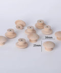 Twenty Piece Set Of One Half Inch Round Unfinished Wood Drawer Knobs Mushroom Shaped Cabinet Pulls with smooth wood finish.