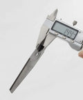 Measuring a metal blade from Eight Piece Metal Lawn Mower Saw Blades And Replacement Heads Set For Cordless Mowers with caliper