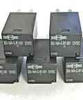 Five black 12V DC SPNO Relay Pack 20A 303-1AH-C-R1-U01 stacked, for DIY electronics and automation projects, with visible labels.